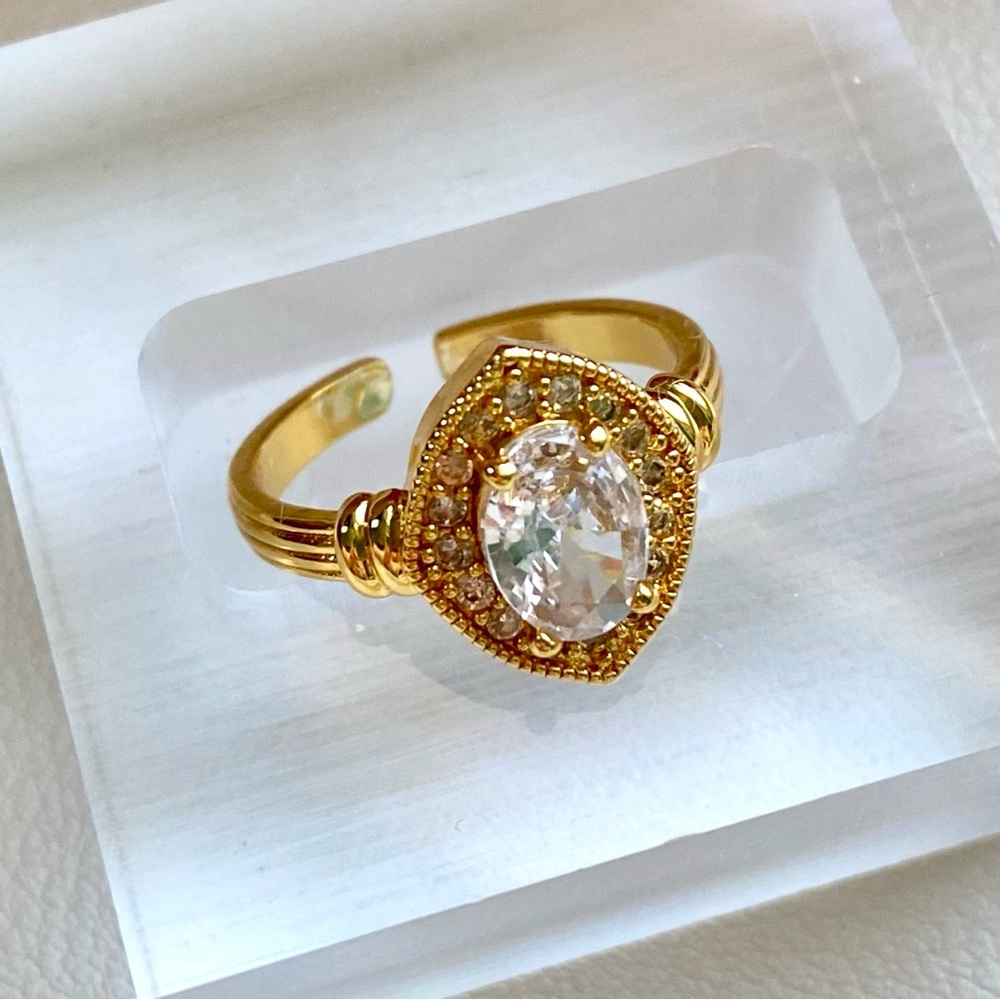 Gold ring with oval cut CZ